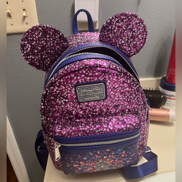 Loungefly Handbags - Disney Purple Sequin Magic Kingdom Fantasyland Loungefly Backpack - COLLECTIBLE